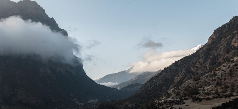 Panorama of mountains surrounding Upper Pisang, over Marshyangdi river, Annapurna circuit, Nepal