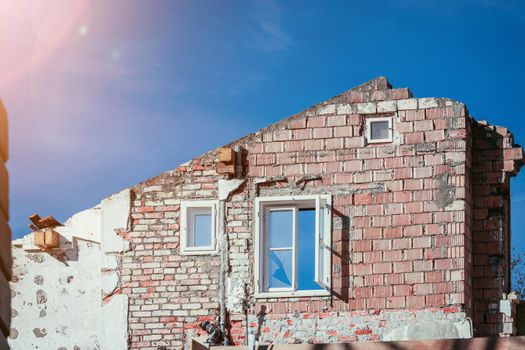 Close up of house front on a construction site, blue sky