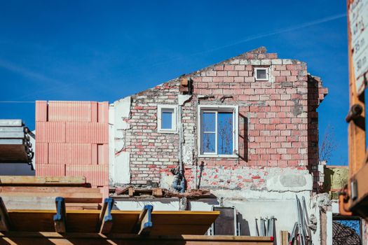 Close up of house front on a construction site, blue sky