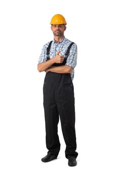 Full length portrait of confident male repairman contractor worker in coveralls with thumb up on white background