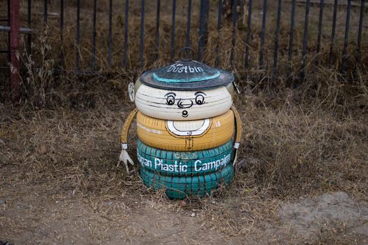 A colorful painted dustbin of a person made of old tires for the Bagan/Pagan plastic campaign in Myanmar