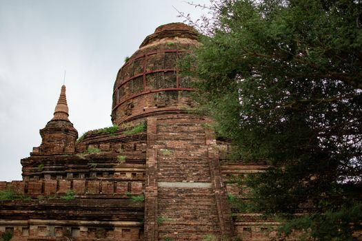 BAGAN, NYAUNG-U, MYANMAR - 2 JANUARY 2020: A few historical and religious pagoda temple from the old Pagan kingdom