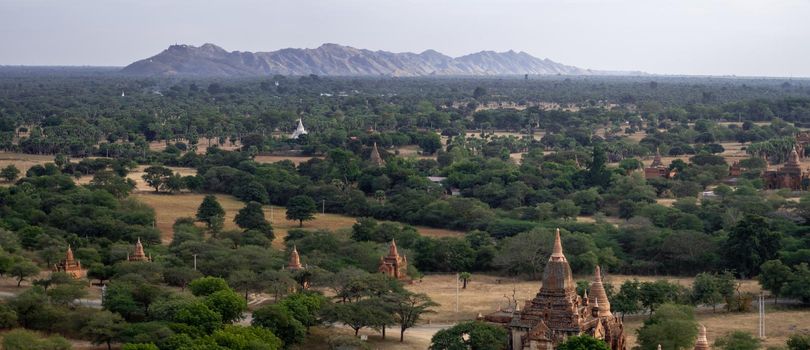 BAGAN, NYAUNG-U, MYANMAR - 3 JANUARY 2020: Looking out over the vast plains of Bagan with its historical temples and fields from the tall Nan Myint viewing tower