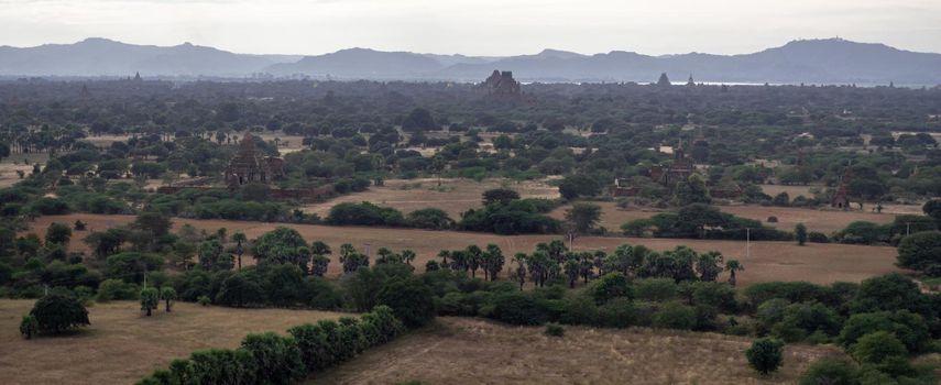 BAGAN, NYAUNG-U, MYANMAR - 3 JANUARY 2020: Looking out over the vast plains of Bagan with its historical temples and fields from the tall Nan Myint viewing tower