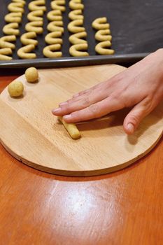 Baking home made Christmas cookies. Classical Czech tradition. Concept for the winter season, food and Christmas holidays.