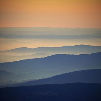 Beautiful landscape and sunset in the mountains. Hills in clouds. Jeseniky - Czech Republic - Europe.