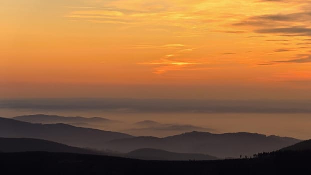 Beautiful landscape and sunset in the mountains. Hills in clouds. Jeseniky - Czech Republic - Europe.