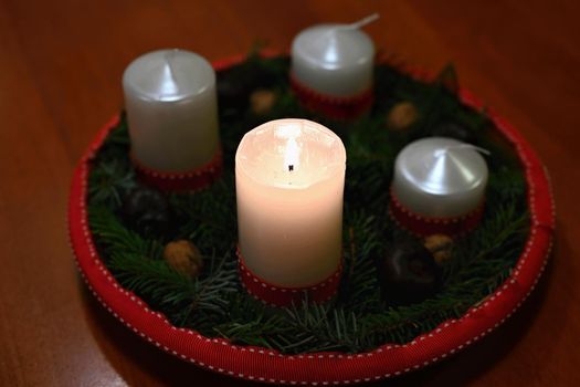 Beautiful Christmas candlelight with candle. Concept for Christmas Winter Time.