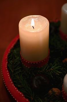 Beautiful Christmas candlelight with candle. Concept for Christmas Winter Time.
