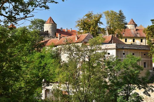 Beautiful Gothic castle Veveri. The city of Brno at the Brno dam. South Moravia - Czech Republic - Central Europe.