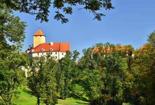 Beautiful Gothic castle Veveri. The city of Brno at the Brno dam. South Moravia - Czech Republic - Central Europe.