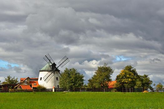 Old windmill - Czech Republic Europe. Beautiful old traditional mill house with a garden. Lesná - Czech Republic