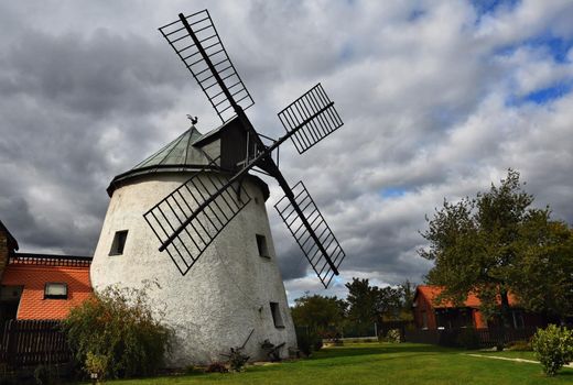 Old windmill - Czech Republic Europe. Beautiful old traditional mill house with a garden. Lesná - Czech Republic