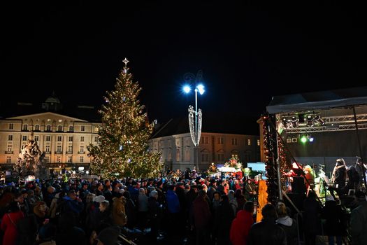 1 December 2019 Brno. Christmas holidays in the center of Brno. Street with shops and Christmas decor with people