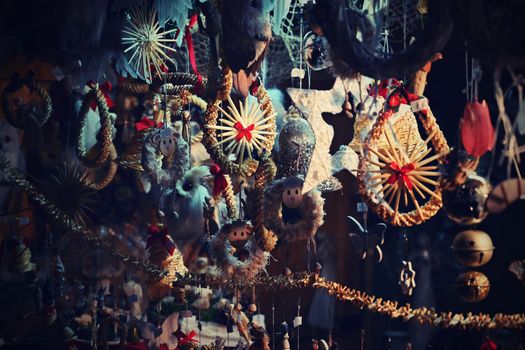 Beautiful old Christmas decorations hanging on a stall at the Christmas markets. Classical and traditional Czech ornaments.