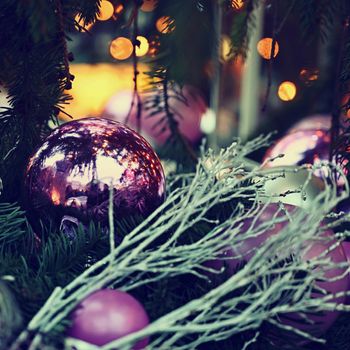 Beautiful Christmas ornament on the Christmas tree with lights. 