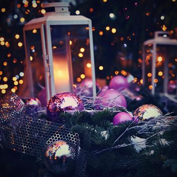 Christmas. Beautiful Christmas ornament on the Christmas tree. Seasonal background for winter holidays.