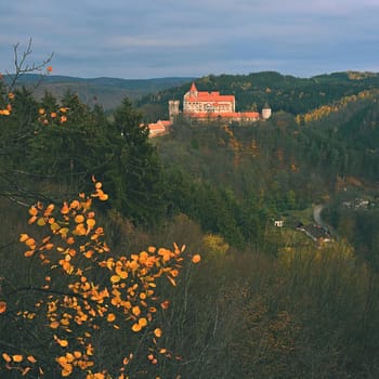 Beautiful old castle in forests with autumn landscape. Castle Pernstejn - Nedvedice. Europe Czech Republic.