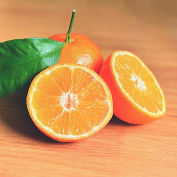 Beautiful fresh fruit - tangerine. Isolated on a clean background.