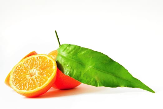 Beautiful fresh fruit - tangerine. Isolated on a clean background.