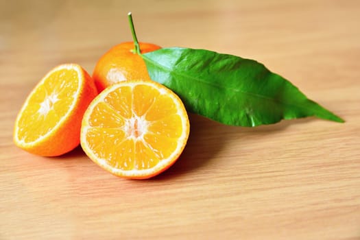 Beautiful fresh fruit - tangerine. Isolated on a clean background.