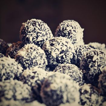 Rum balls. Traditional Czech Christmas cookies. Cocoa coated in coconut.