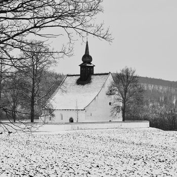 Winter landscape with a beautiful chapel near castle Veveri. Czech Republic city of Brno. The Chapel of the Mother of God.