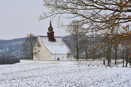 Winter landscape with a beautiful chapel near castle Veveri. Czech Republic city of Brno. The Chapel of the Mother of God.
