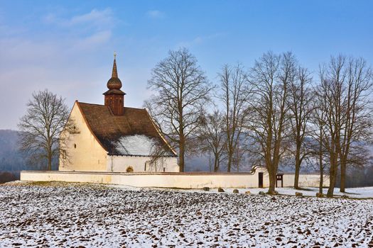 Winter landscape with a beautiful chapel near castle Veveri. Czech Republic city of Brno. The Chapel of the Mother of God.