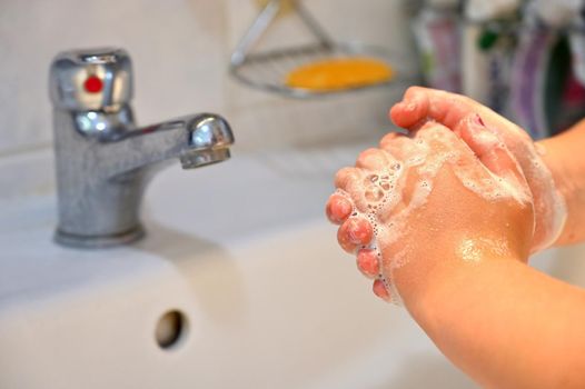 Thorough hand washing with disinfectant soap. Quarantine - domestic hygiene. Measures against coronavirus disease. (COVID-19)