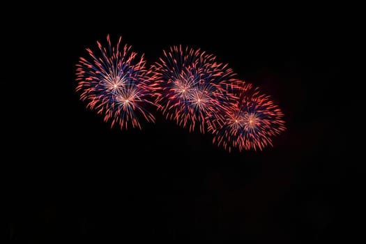 Beautiful colorful fireworks with reflections in water. Brno dam, the city of Brno-Europe. International Fireworks Competition.