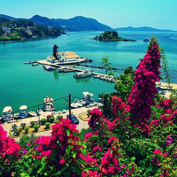 Corfu island. (Kerkyra) Greece. Beautiful Vlacherna Monastery and Mouse island. (Pontikonisi) Beautiful colorful island for summer holidays/vacation and travel.