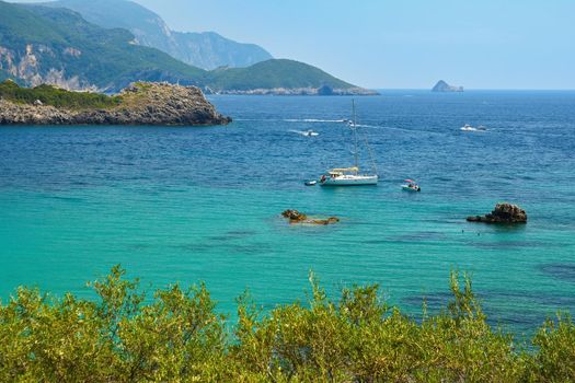 Beautiful Paleokastrica beach landscape on Corfu, Kerkyra, Greece. Beautiful colorful island for summer holidays and travel.