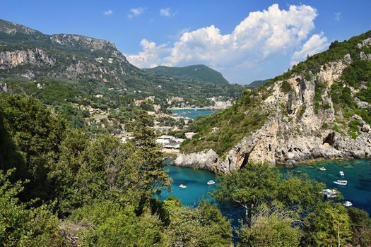 Beautiful Paleokastrica beach landscape on Corfu, Kerkyra, Greece. Beautiful colorful island for summer holidays and travel.