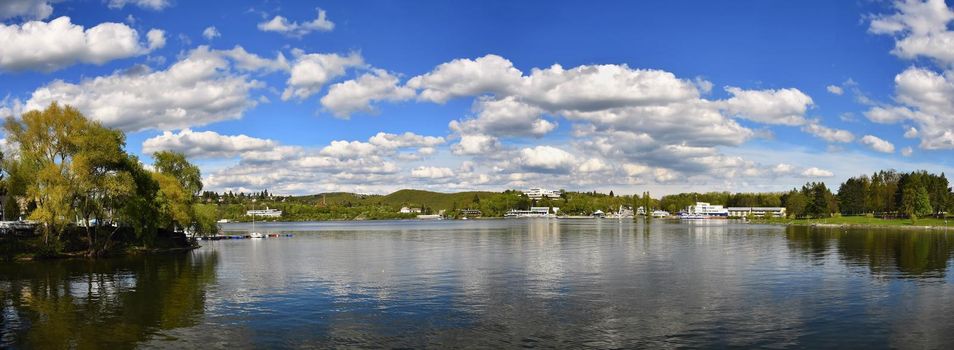 Brno dam. South Moravia. Czech Republic Europe. Recreational area of entertainment and sports. Beautiful countryside with nature, clear water and sky with sun and clouds.