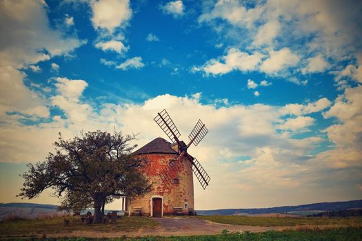 Beautiful old windmill in autumn time. Landscape photo with architecture at sunset (golden hour). Kunkovice - Czech Republic - Europe.