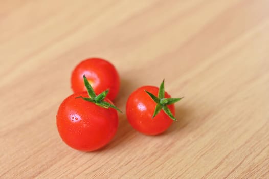 Beautiful small cherry fresh tomatoes. Healthy vegetables - organic food.