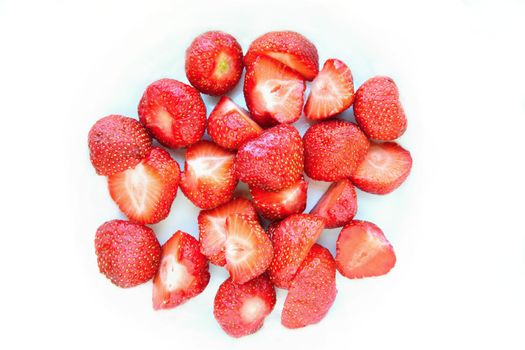 Beautiful fresh strawberries isolated on a clean white background