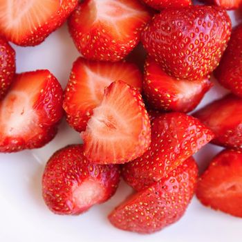 Beautiful fresh strawberries isolated on a clean white background