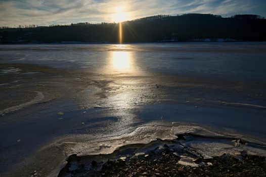 Winter landscape with frozen water. Brno Reservoir - dam. Czech Republic Europe.