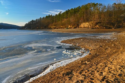 Winter landscape with frozen water. Brno Reservoir - dam. Czech Republic Europe.