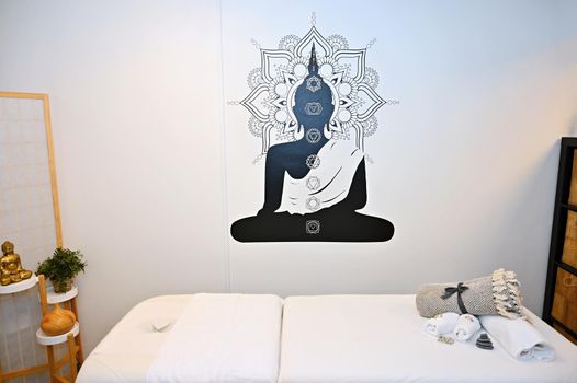 Massage room interior. Massage couch with accessories for massages and rehabilitation.