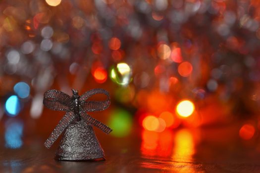 Christmas decorations. Beautiful Christmas tree ornaments on abstract, blurred colorful background. Concept for winter, holiday and snow.