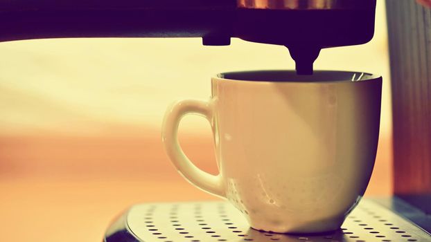 Espresso machine brewing a coffee.