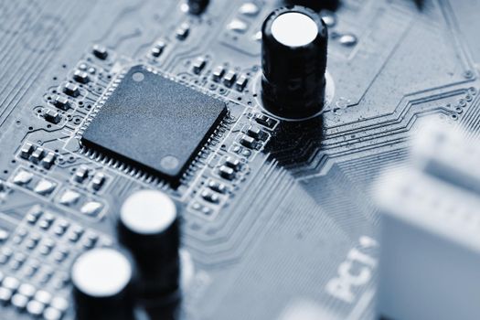 Components on board. PCB to PC. Chip, capacitor and connectors on the motherboard of a personal computer. Modern technological background.