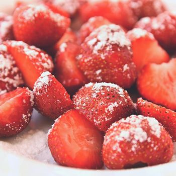 Beautiful fresh strawberries isolated on a clean white background