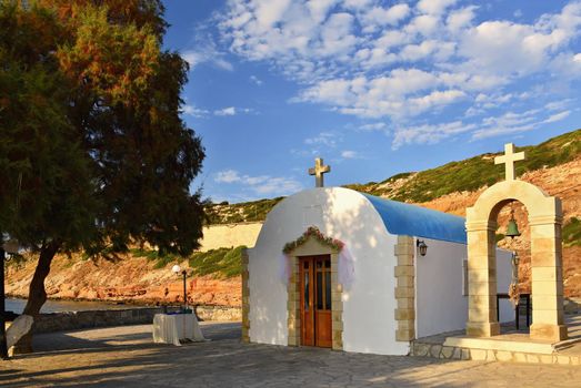 Beautiful little Greek chapel at sunset on the island of Crete - Greece.