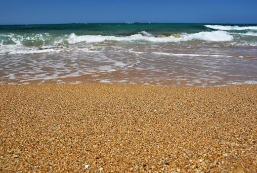 Beautiful clean sea and waves. Summer background for travel and holidays. Greece Crete.. Amazing scenery on the beach. 