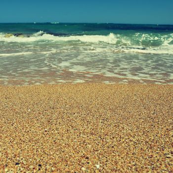 Beautiful clean sea and waves. Summer background for travel and holidays. Greece Crete.. Amazing scenery on the beach. 