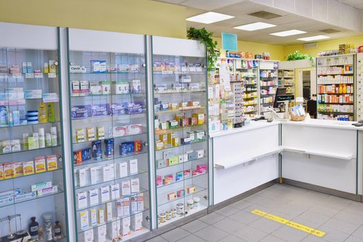 May 2, 2016 Brno Czech Republic. Interior of a pharmacy with goods and showcases. Medicines and vitamins for health. Shop concept, medicine and healthy lifestyle.